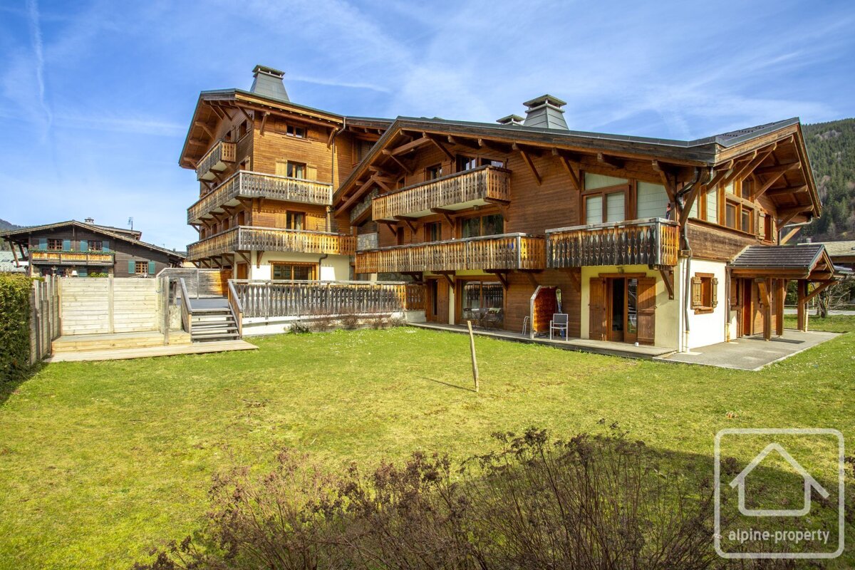 A large house with alpine property written on it