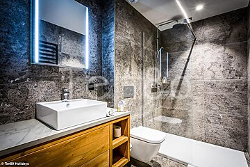 A bathroom with a sink toilet and shower taken by ten80 holidays