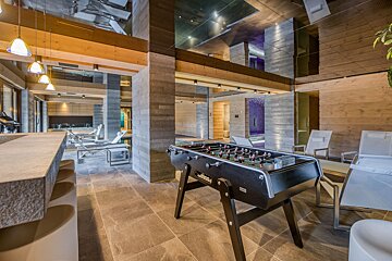 A foosball table in the middle of a room