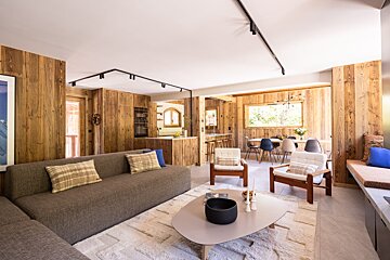 A living room with a couch and a coffee table