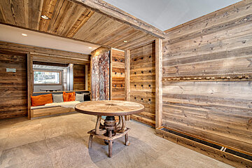 A bedroom with bunk beds that look like houses