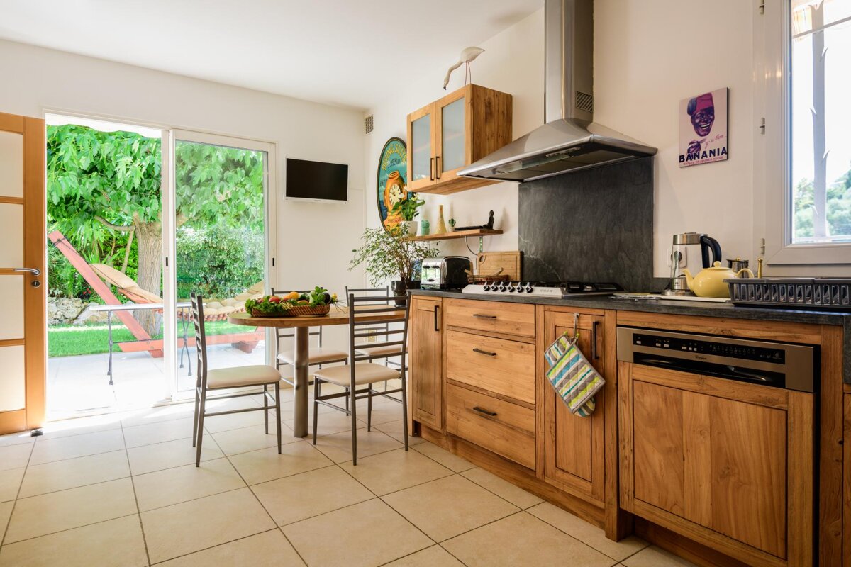A kitchen with a sign on the wall that says bavaria