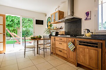 A kitchen with a sign on the wall that says bavaria