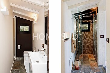 A bathroom with the word home on the wall