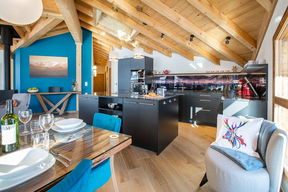 A kitchen with a bottle of wine that says v on it