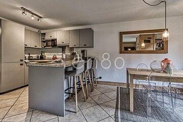 A kitchen with the number 80 on the wall