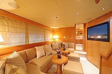 A living room with a couch and a flat screen tv
