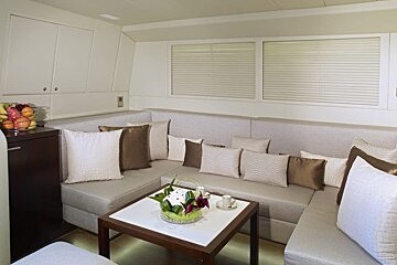 A living room with a couch and a coffee table