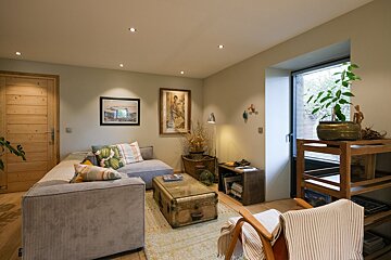 A living room with a couch and a coffee table