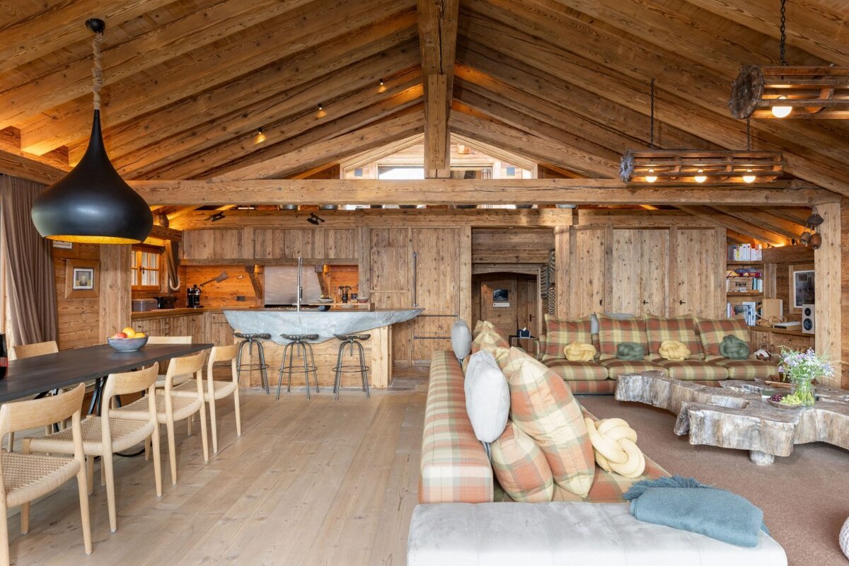 A living room with a couch and a table