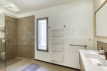 A bathroom with the words made in provence on the wall