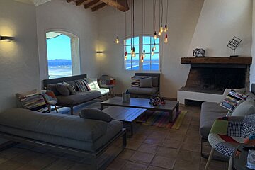 A living room filled with furniture and a fireplace