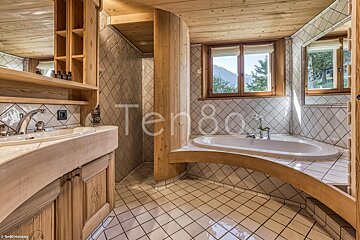 A bathroom with the word ten80 on the wall