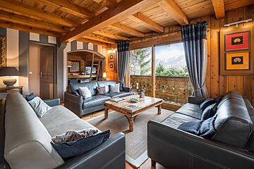A living room with two couches and a coffee table