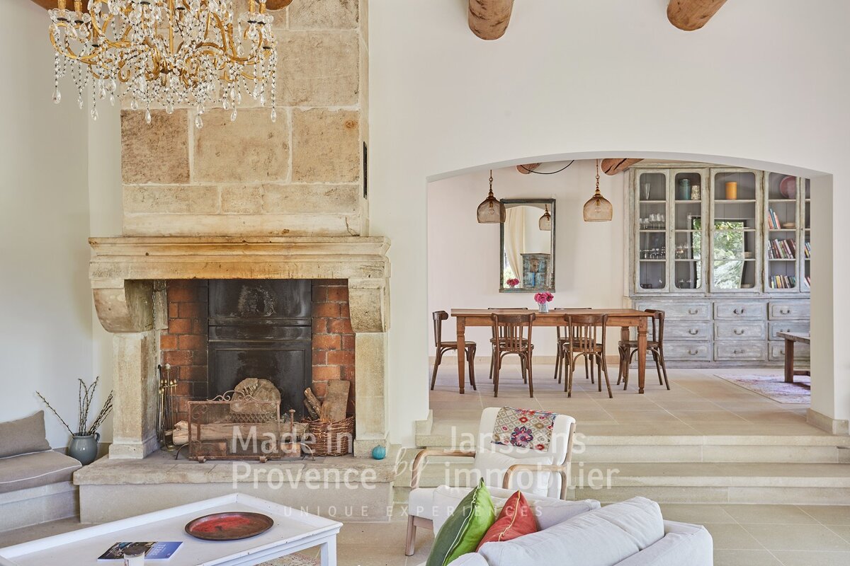 A living room with a fireplace made in provence