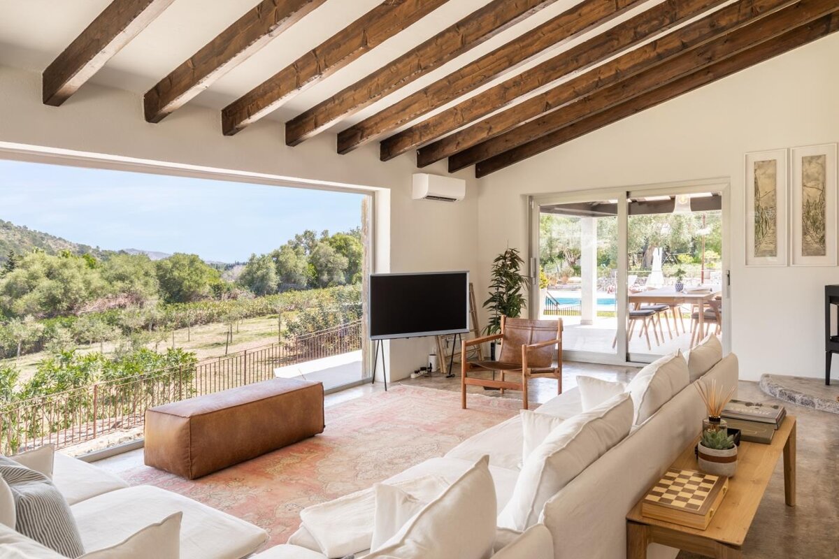 A living room with a couch and a flat screen tv