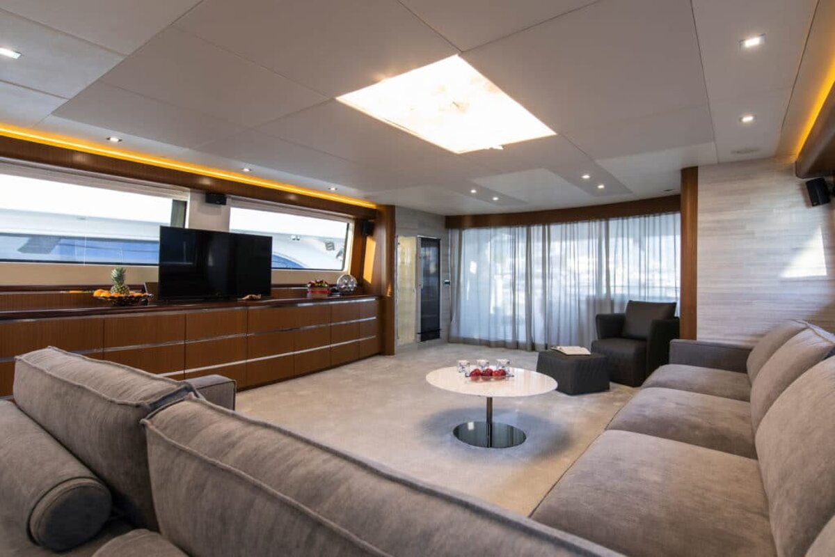 A living room with a couch and a table