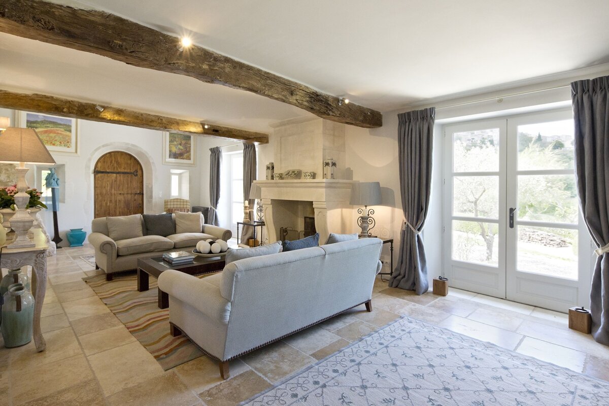 A living room with a fireplace and a couch