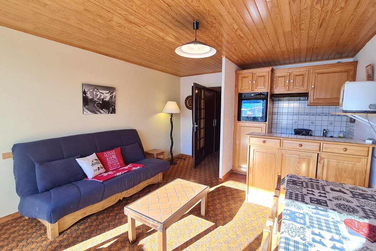 A living room with a couch and a coffee table
