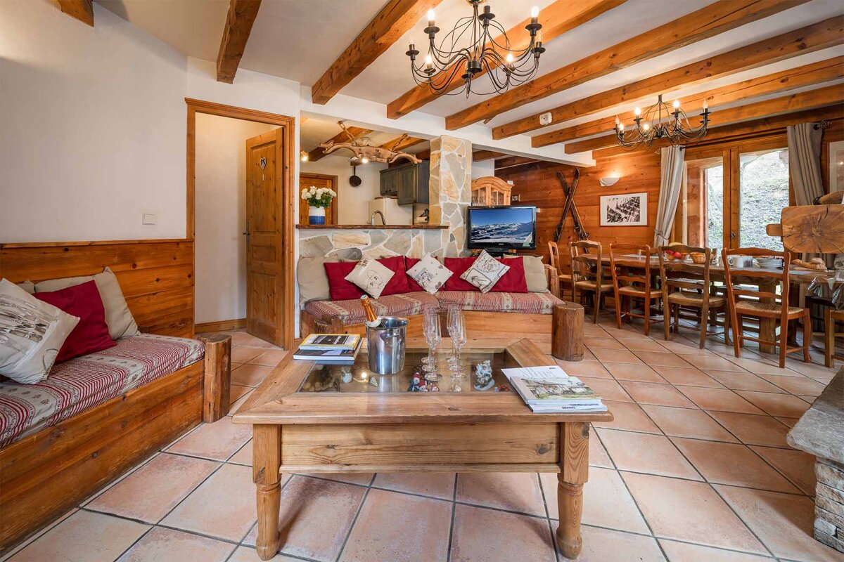 A living room with a couch and a coffee table
