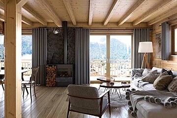 Cozy wooden chalet interior featuring a fireplace, comfortable seating, and large windows with a stunning snowy mountain view.