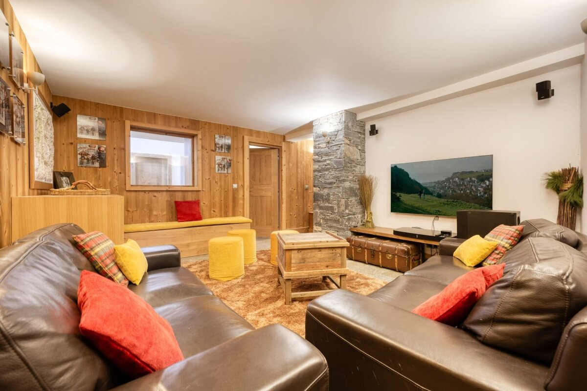 A living room filled with furniture and a flat screen tv