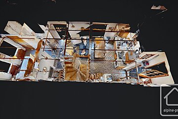 An aerial view of a house with the words cuisine and entree visible