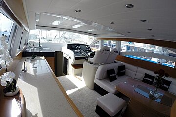The interior of a yacht with miss written on the seats