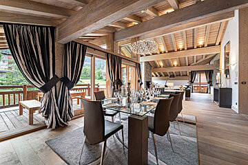 A kitchen with stainless steel appliances and a wine cooler