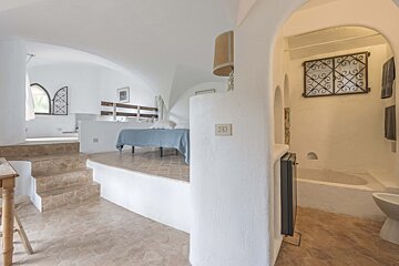 A white wall with a light switch that says 330 on it