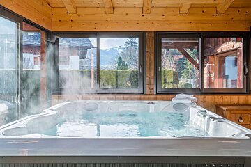 A hot tub with steam coming out of it