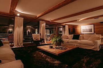 A living room with a couch and a coffee table