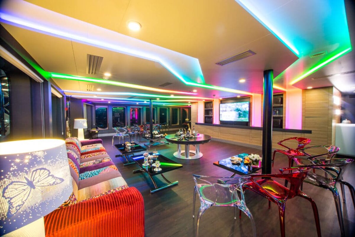 A room with a lot of colorful lights on the ceiling