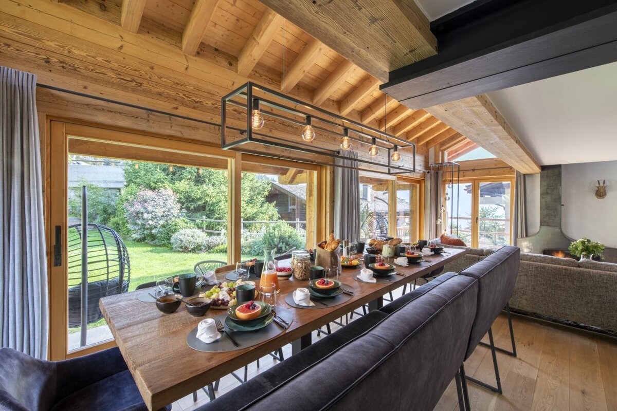A dining room table with a lot of food on it