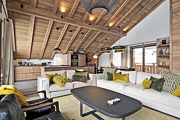 A living room with a couch and a coffee table