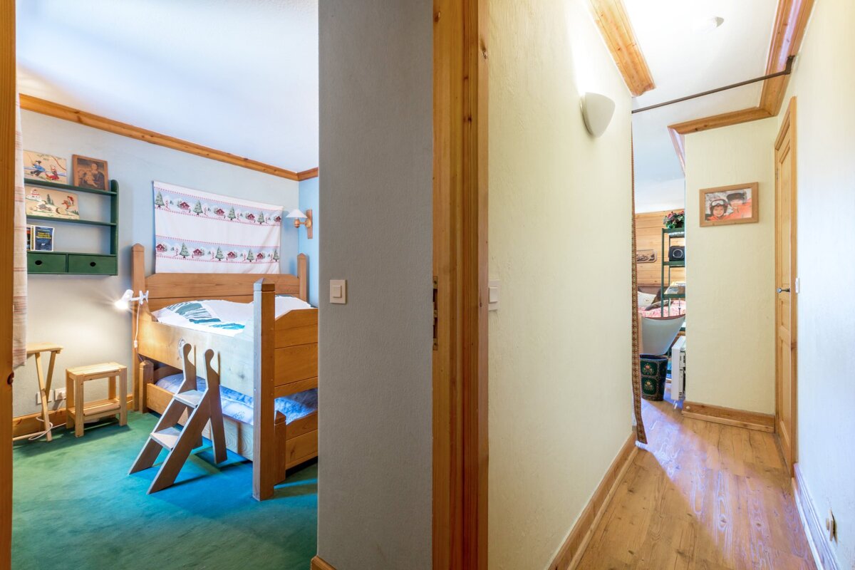A dining room table with a pitcher on top of it