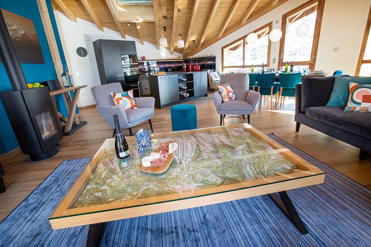 A living room with a map on the coffee table