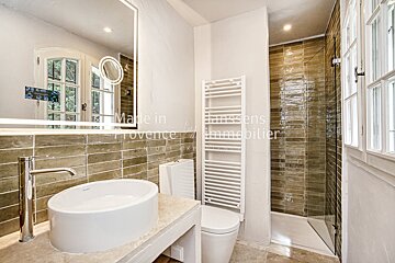 A bathroom with the words made in provence on the wall