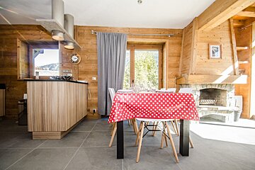 A table with a red and white polka dot table cloth