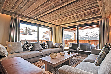 A living room with a couch and a coffee table