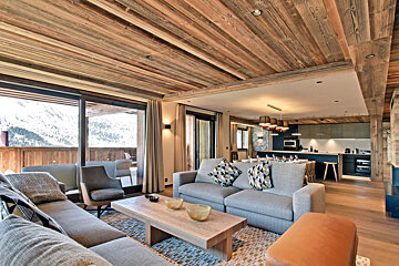 A living room with a couch and a coffee table