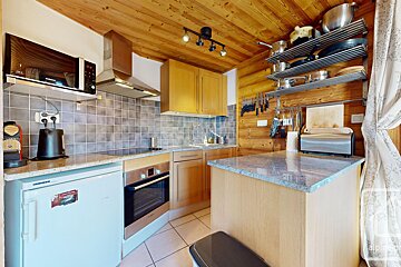 A kitchen with a siemens brand refrigerator