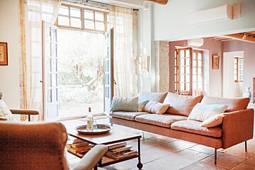 A living room with a couch and a coffee table