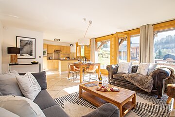 A living room with a couch and a coffee table