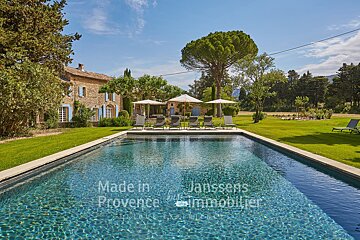 A large swimming pool with the words made in provence on the bottom