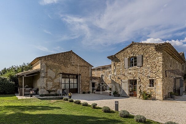 A stone building with a sign that says ' a ' on it