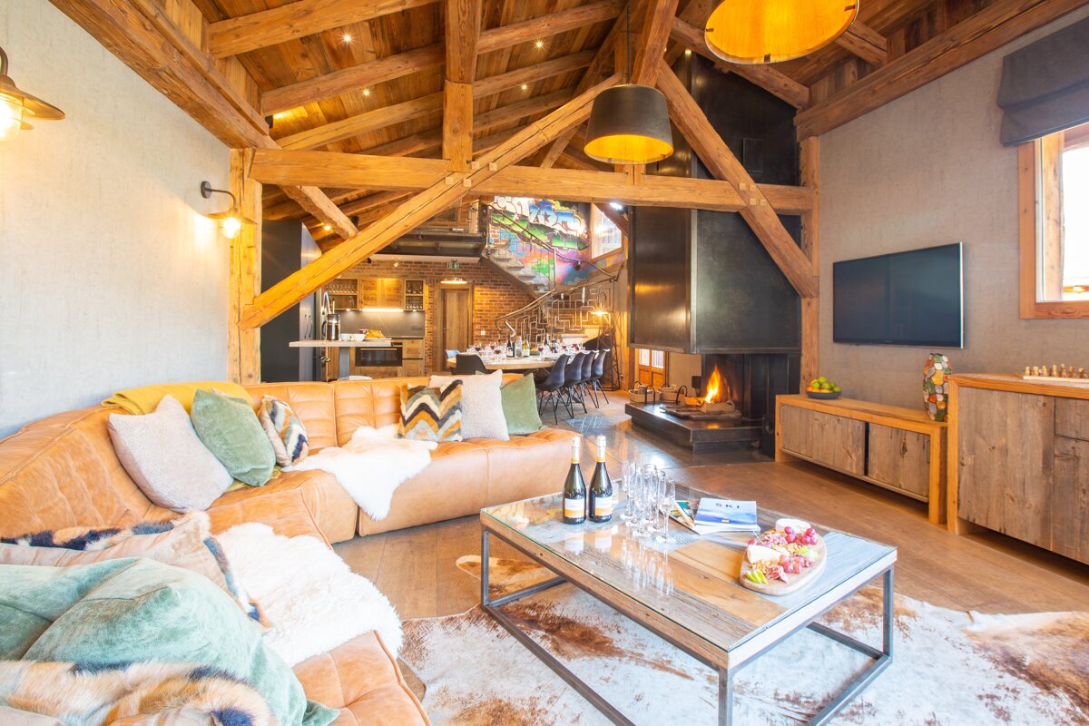 A living room with a couch and a coffee table