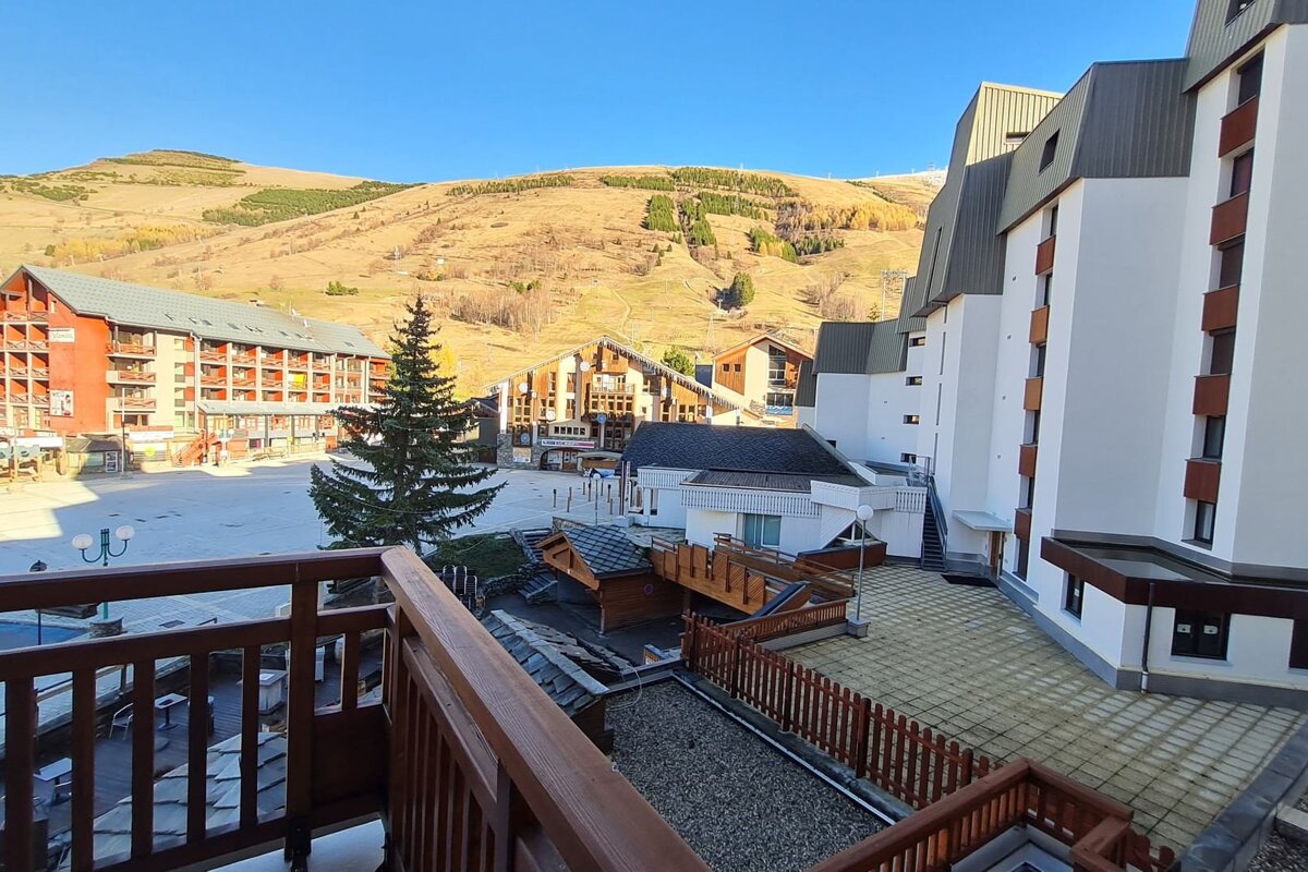 A view of a ski resort from a balcony