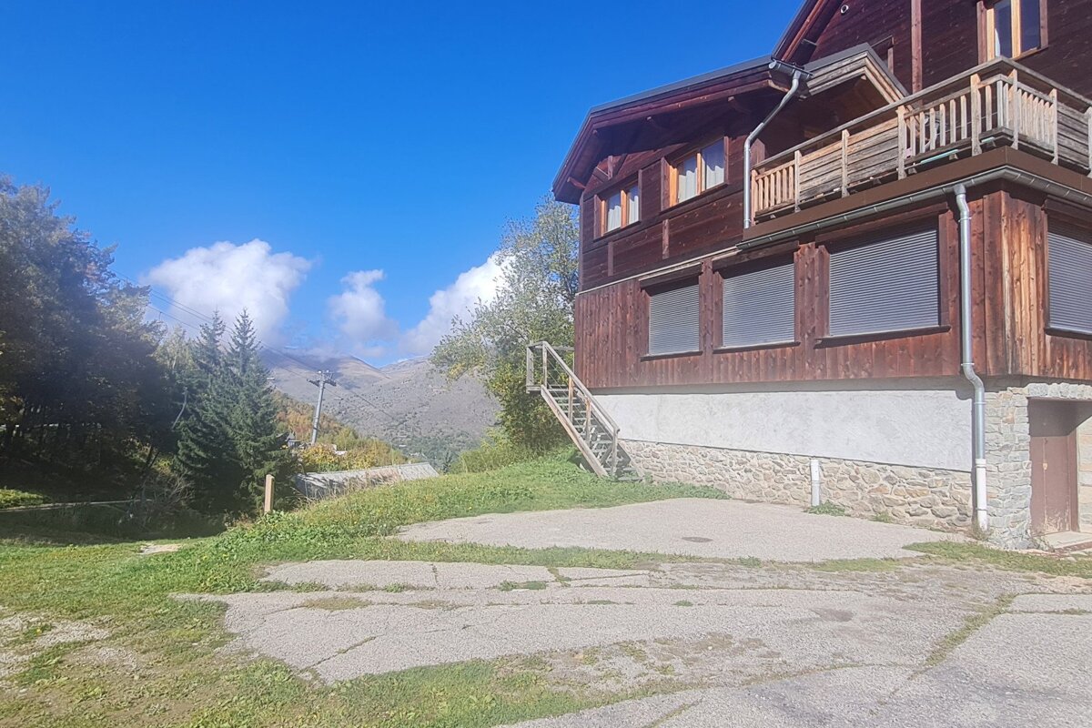 A house with a staircase leading up to the second floor