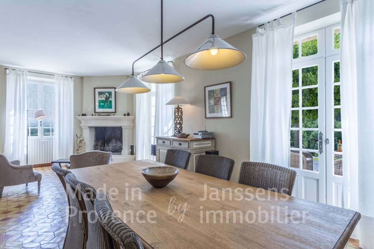 A dining room table is made in provence by janssens immobilier
